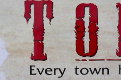 Closeup of Tombstone logo (front side)